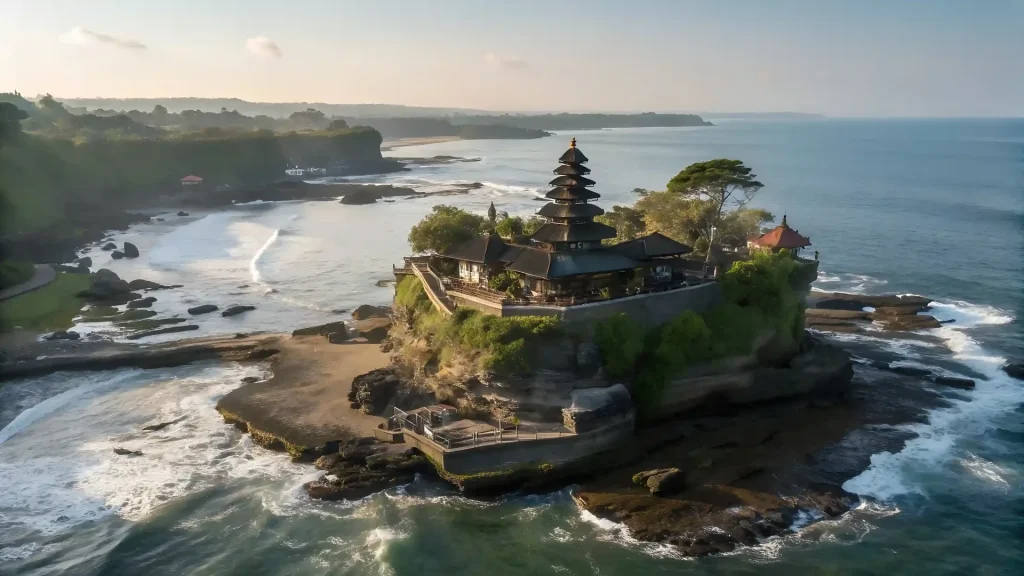 Tanah Lot sea temple on a rocky outcrop surrounded by waves in Bali